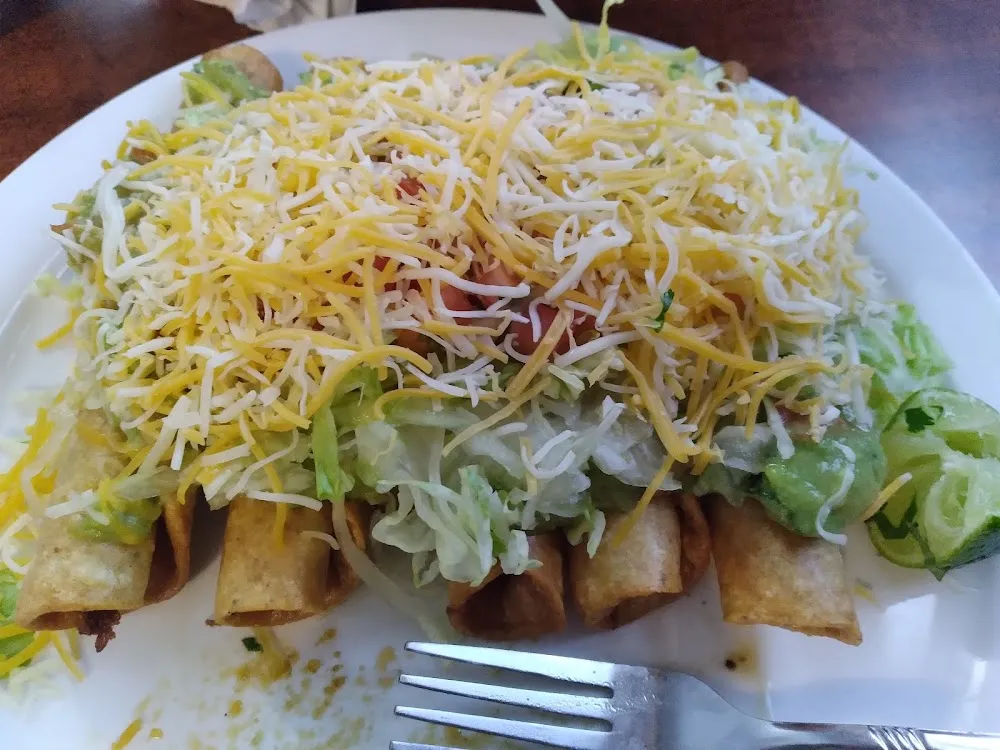 5 Rolled Shredded Beef Tacos